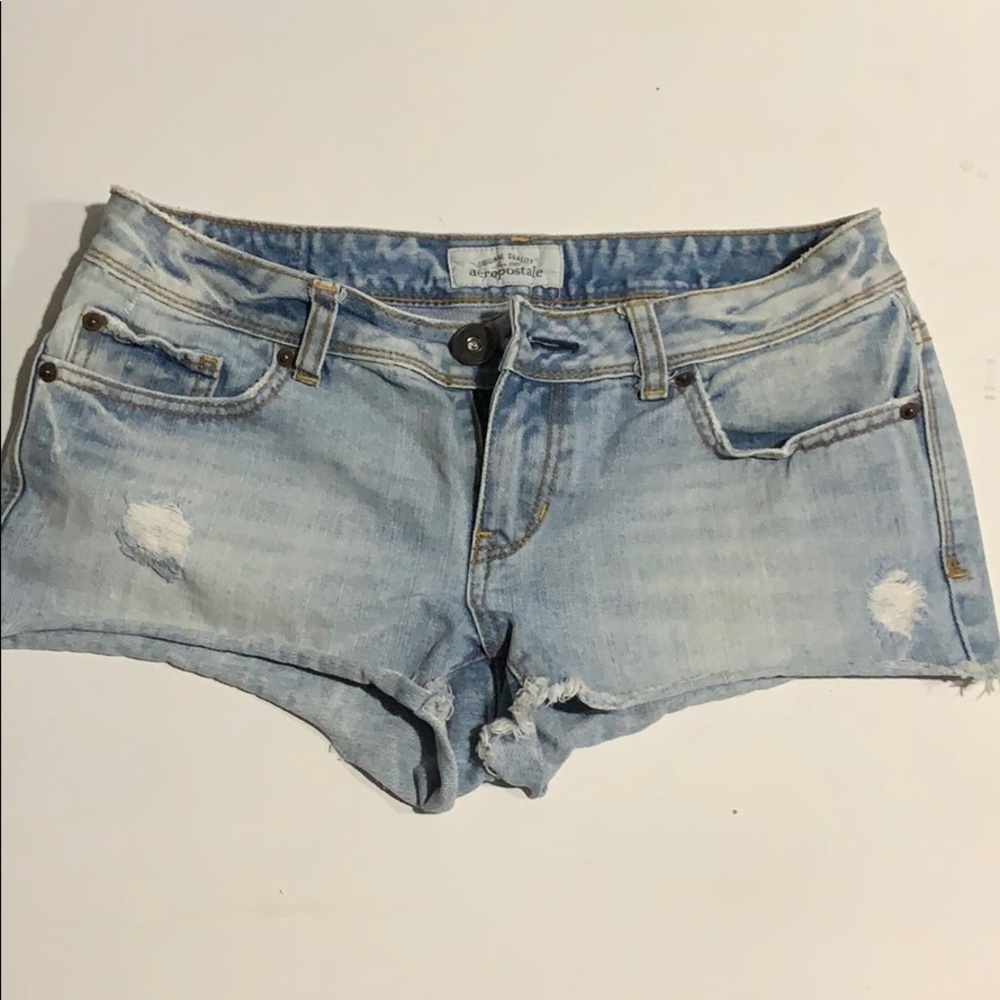 Distressed denim shorts